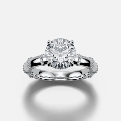 Station Halo with a round center in white gold, our design as the jeweler approves it